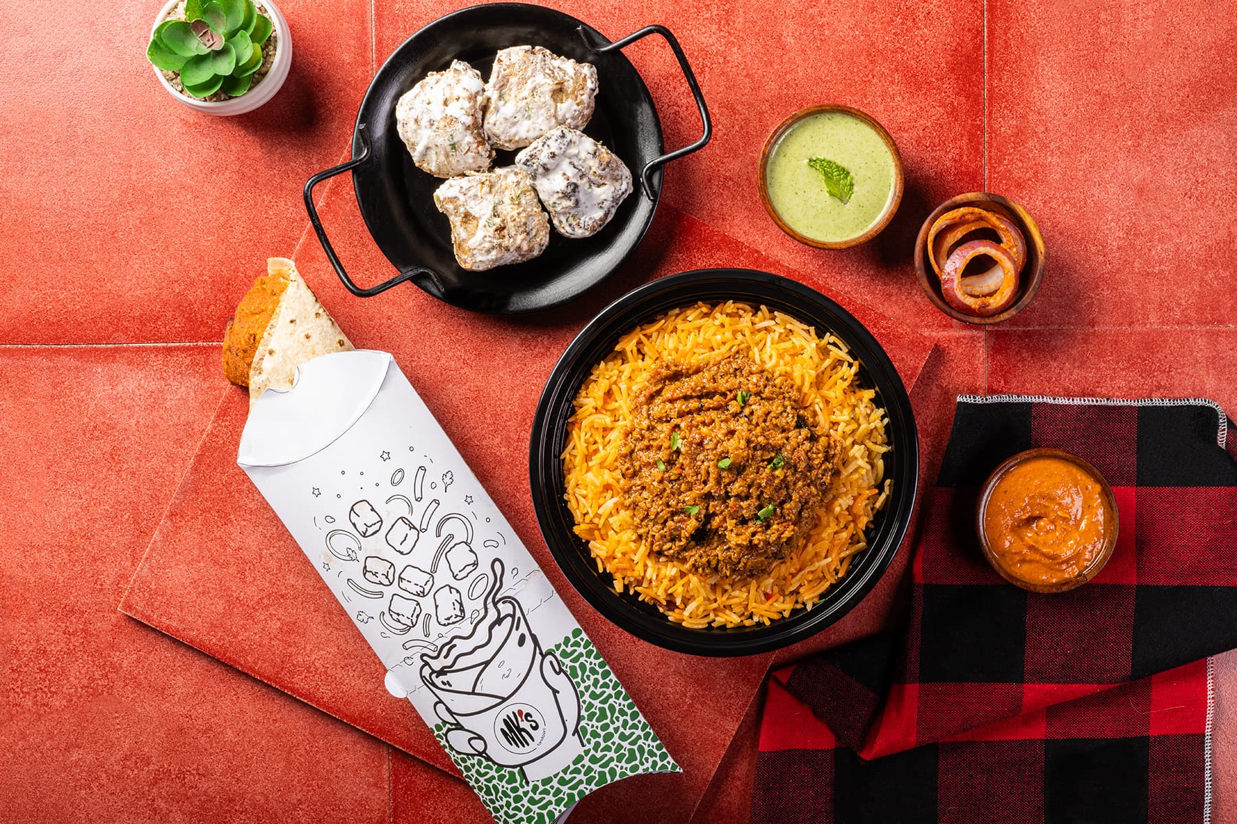 Malai soya chaap, a roll and a soya keema rice bowl